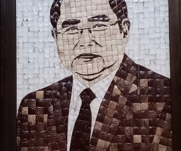 Tranh gáo dừa Thủ Tương Phạm Minh Chính
